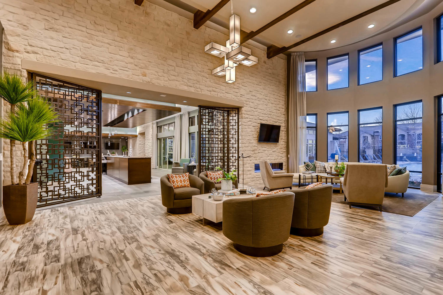 community lobby with designer lighting and comfortable seating